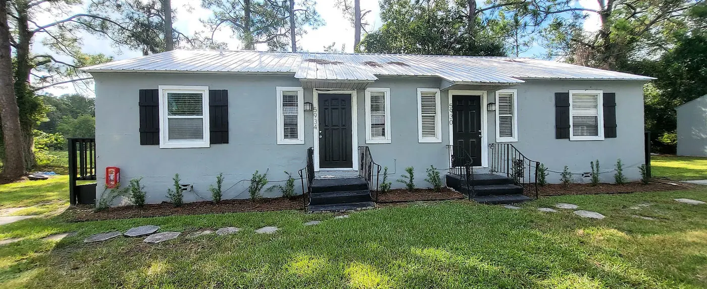 Gray single-story duplex at Oak Hill
